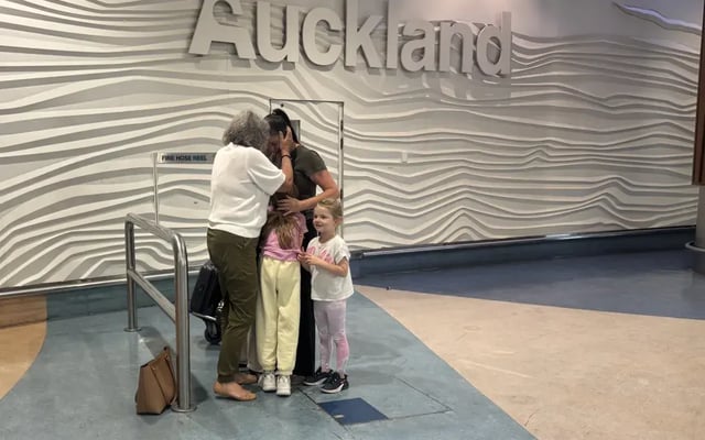 Grandma Claire Eadie welcomed the flight arriving to Auckland from Dubai with hugs for daughter-in-law Rebecca Fleming and three grandchildren. 