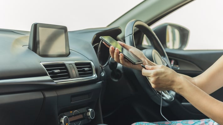 Two injured after driver drifts across road distracted by phone