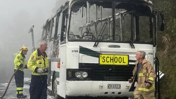 Four children escape as bus goes up in flames at Leigh