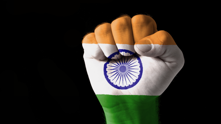 A fist in the colours of the Indian national flag
