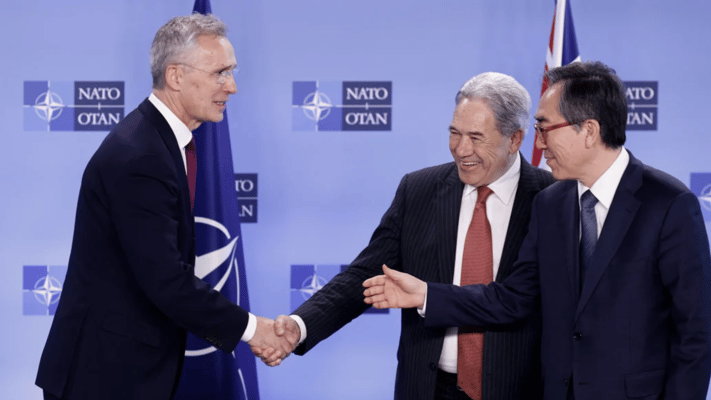 NATO Secretary General Jens Stoltenberg with Minister of Foreign Affairs Winston Peters and South Korean Foreign Minister Cho Tae-yul. Photo: Kenzo TRIBOUILLARD / POOL / AFP