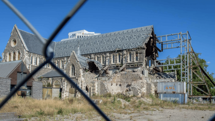 ChristChurch Cathedral which was damaged in the earthquakes of 2011 is seen behind a fence