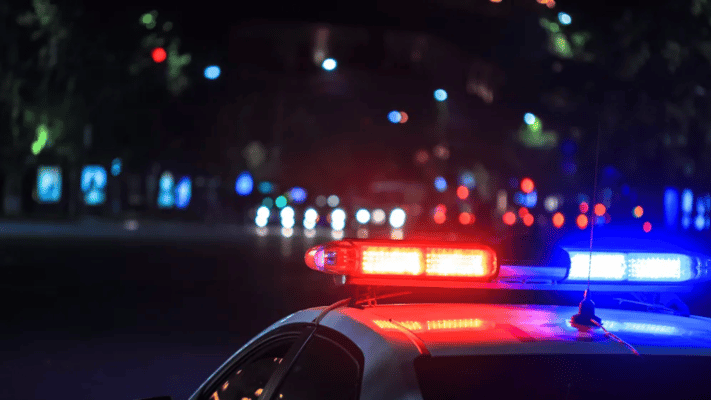 A man has been arrested after allegedly presenting what appeared to be a gun to another man during the sale of a vehicle.