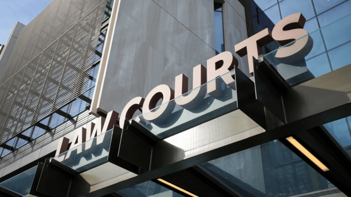 A woman who has been jailed for two years for trying to attack her husband of 50 years with a carving knife was under significant mental stress as his sole caregiver, a court has heard