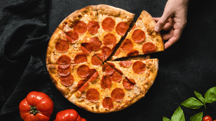 A 28-year-old man has been arrested after allegedly threatening a woman with a knife and stealing her pizzas in Auckland’s central city on Monday night.