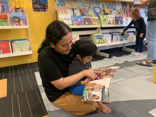 IMG_Reading my book at Mt Roskill lib