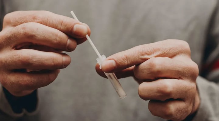 Only household contacts who developed one or more symptoms were recommended to stay at home and RAT test
