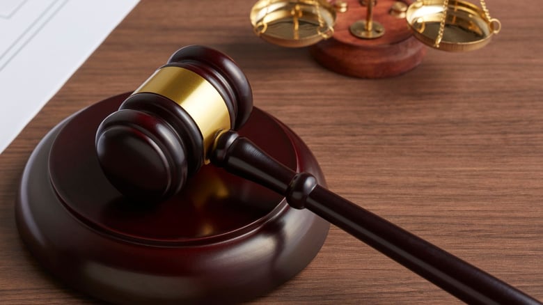 Former business director sentenced in&nbsp;immigration scam