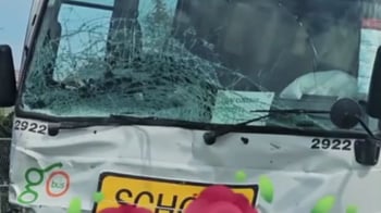 Baby dies after school bus collision, town in grief