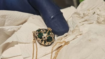 Man accused of swallowing Fabergé pendant pleads not guilty