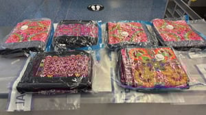 NZ National charged after 21kg heroin seizure at Sydney airport