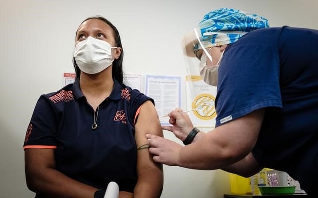 Border workers receive Covid vaccinations: 'We're in it together'