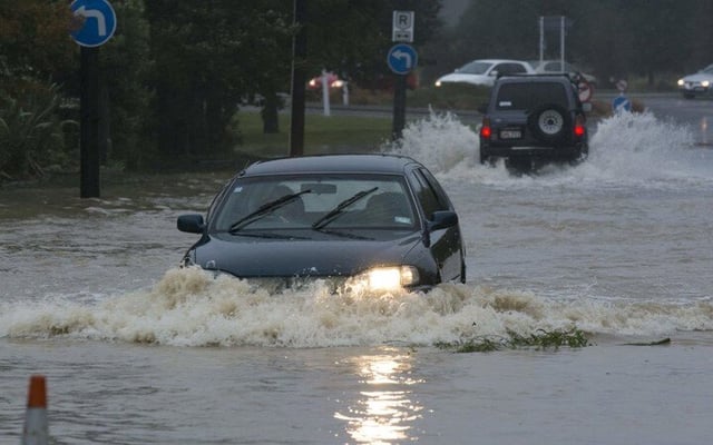 'Once-in-a-100-year' rain, floods continue in New Zealand