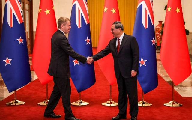 Déjà vu for prime minister abroad as ministerial trouble brews back home